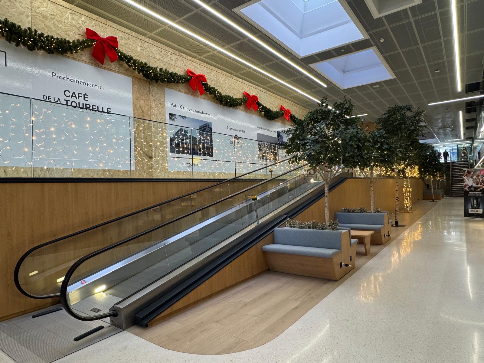 Travelators and railings are dressed up for the occasion